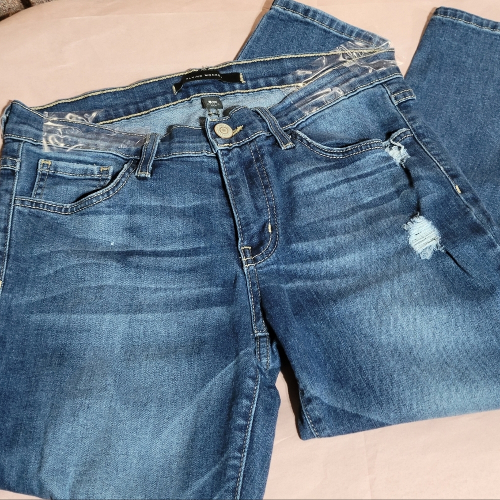 Flying Monkey Mid Rise Distressed Skinny Jeans Size 28. Medium/Dark Wash.